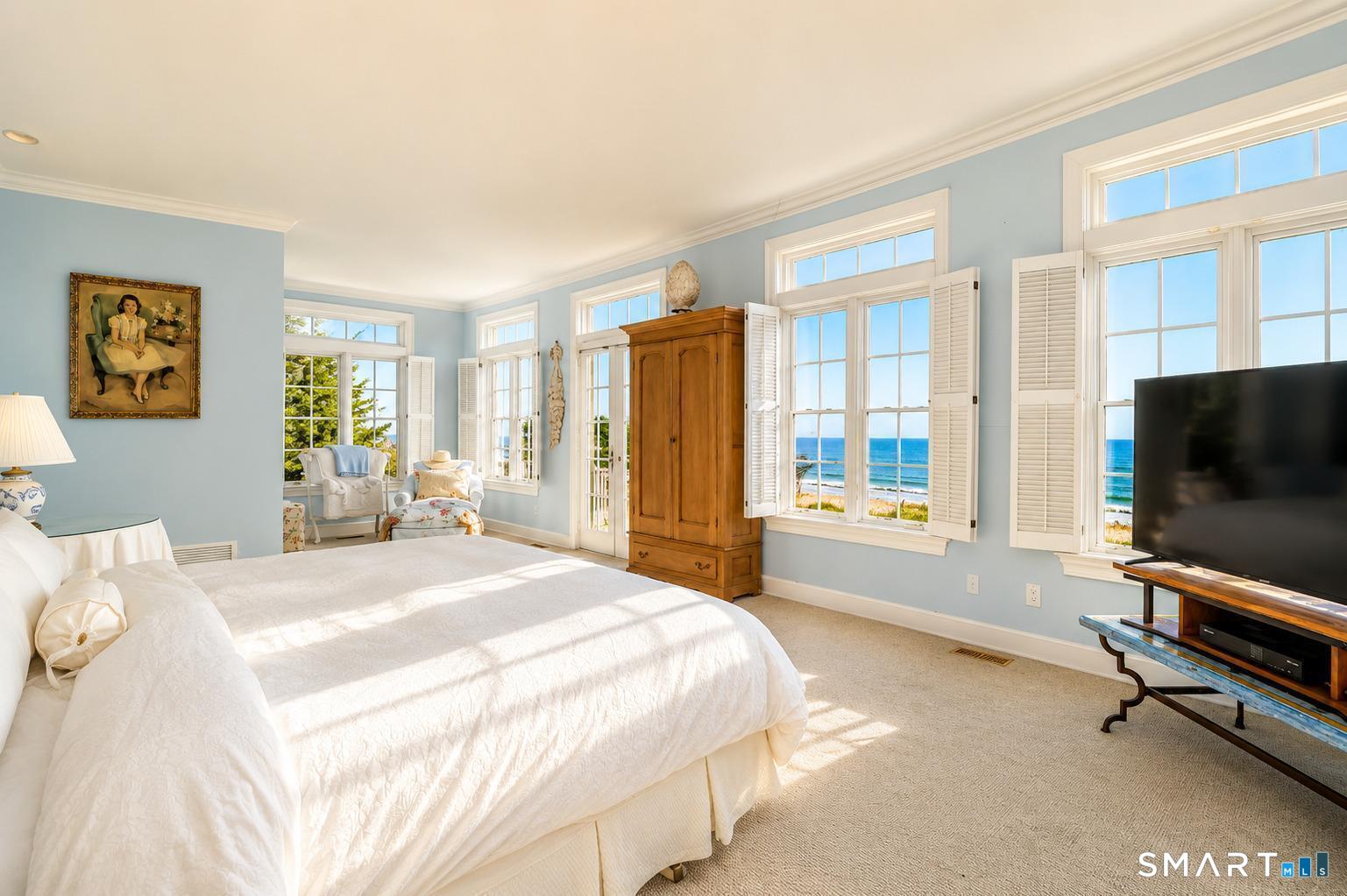 1681 Fairfield Beach Road Fairfield, CT 06824 - Photo 21 of 36 There is a difference between seeing the water and feeling connected to it. This primary suite was designed for those who truly love the shoreline.