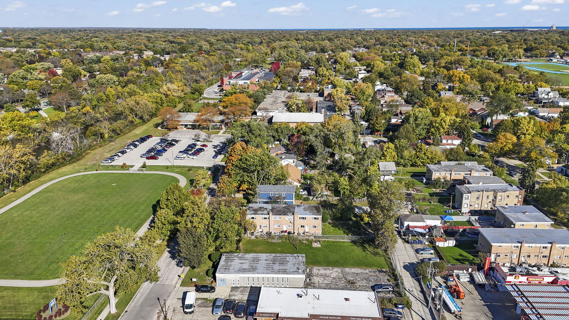 1311 Mcdaniel Avenue, Unit C Evanston, IL 60201 - Photo 29 of 40 an aerial view of a city with lots of residential buildings ocean and mountain view in back