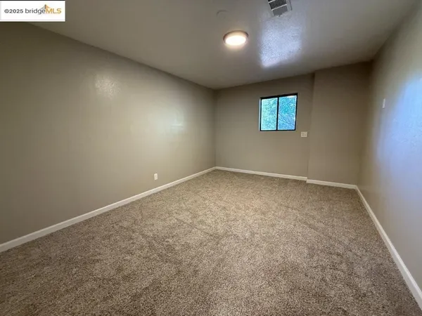 an empty room with a workbench