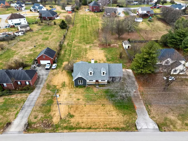 swimming pool with couple of relaxing chair