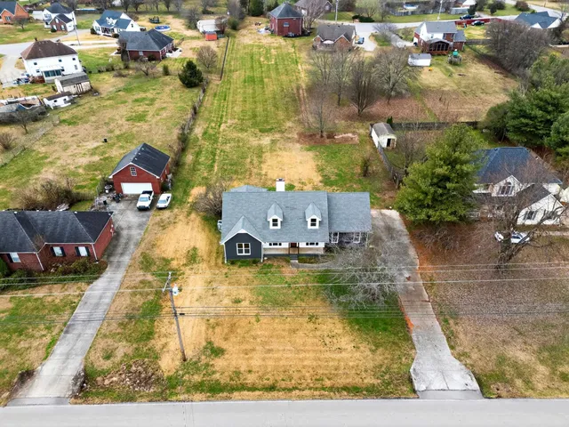 swimming pool with couple of relaxing chair