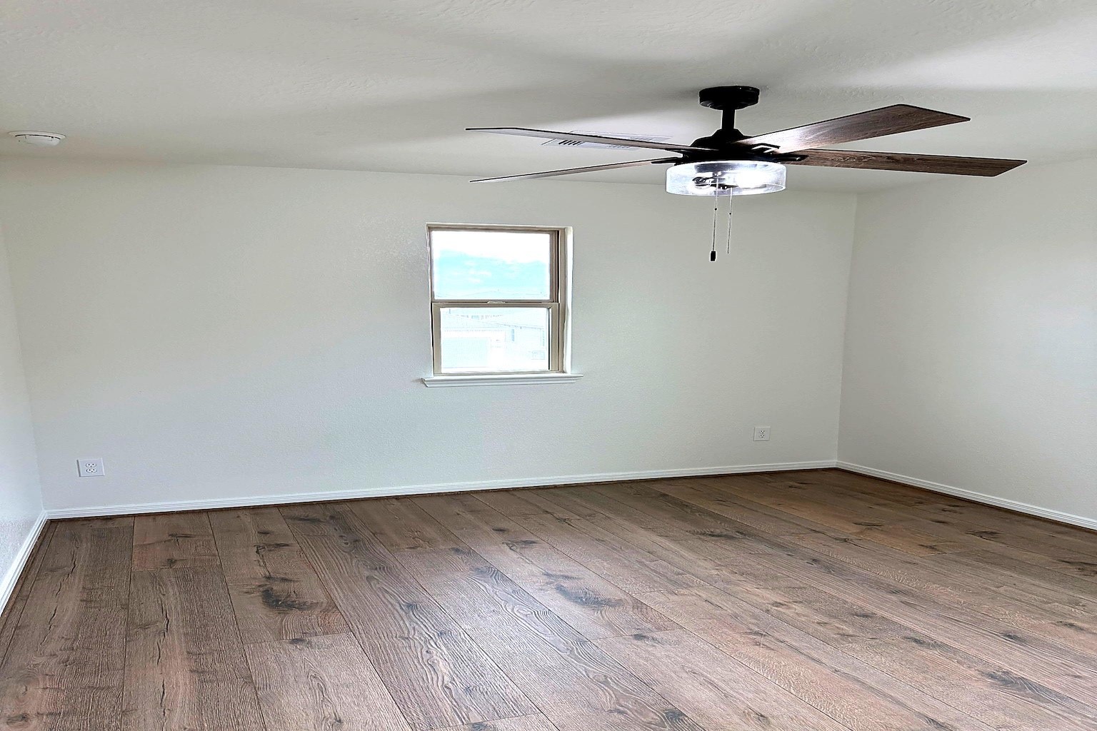 20818 Filbert Lane Katy, TX 77449 - Photo 13 of 19 Bedroom #2 provides wood flooring, ceiling fan.