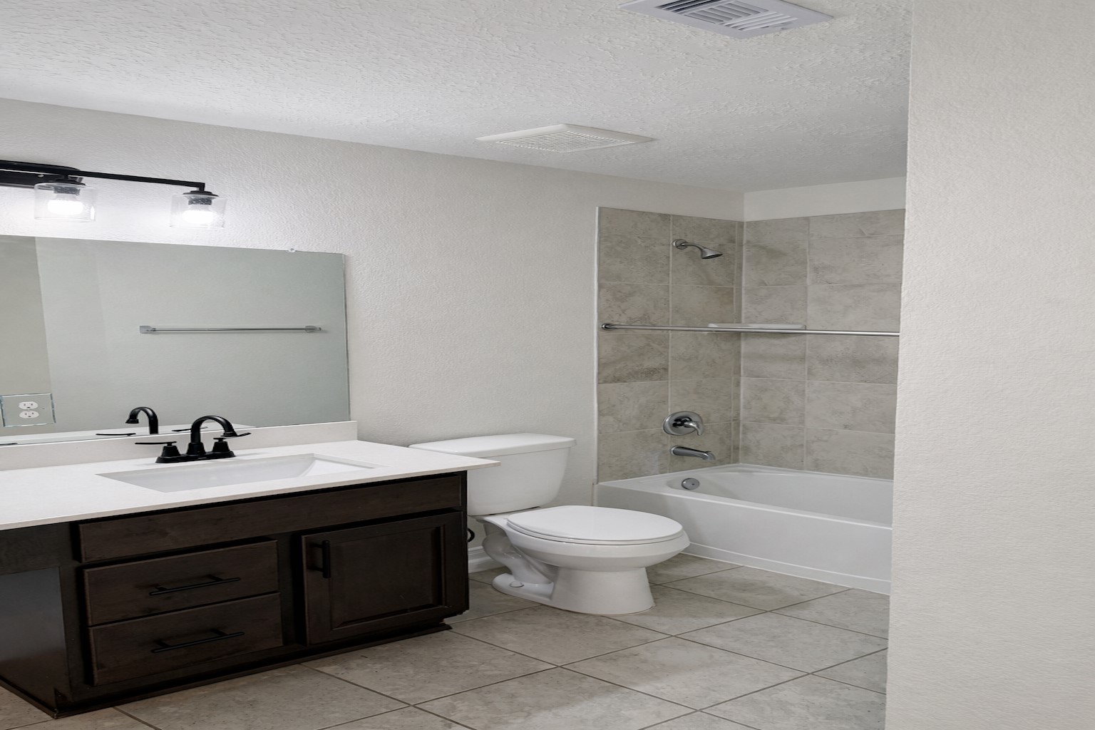 20818 Filbert Lane Katy, TX 77449 - Photo 14 of 19 Bathroom #2 full with tub/shower combo, tile flooring.