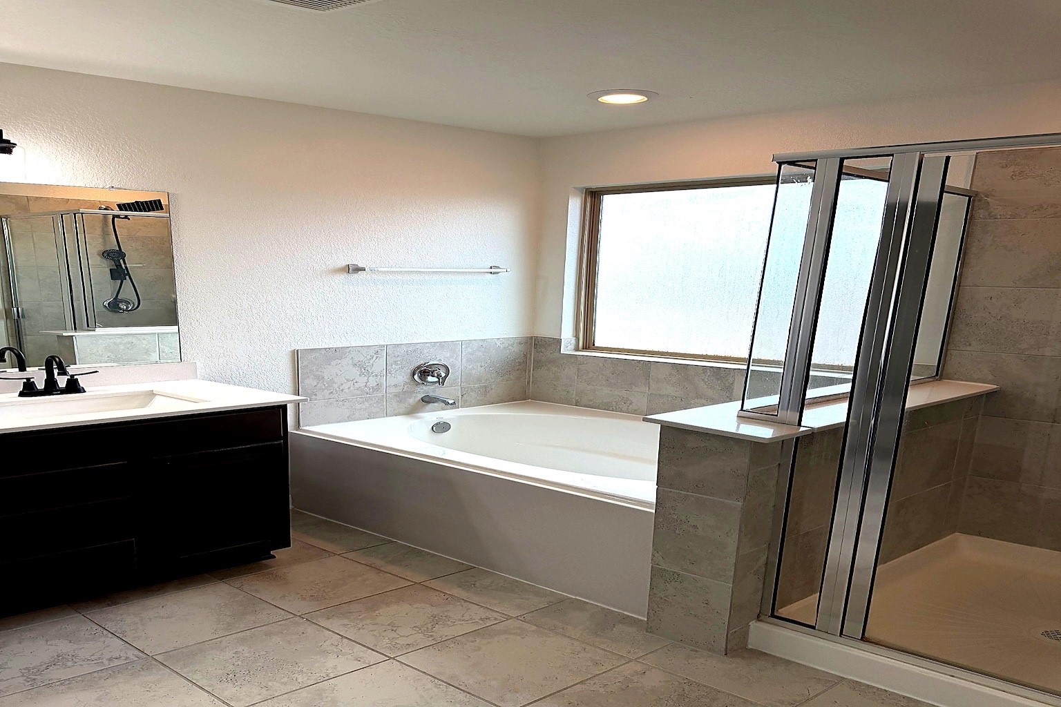 20818 Filbert Lane Katy, TX 77449 - Photo 10 of 19 Primary Bathroom provides tile flooring, tub separate from shower, tile flooring.