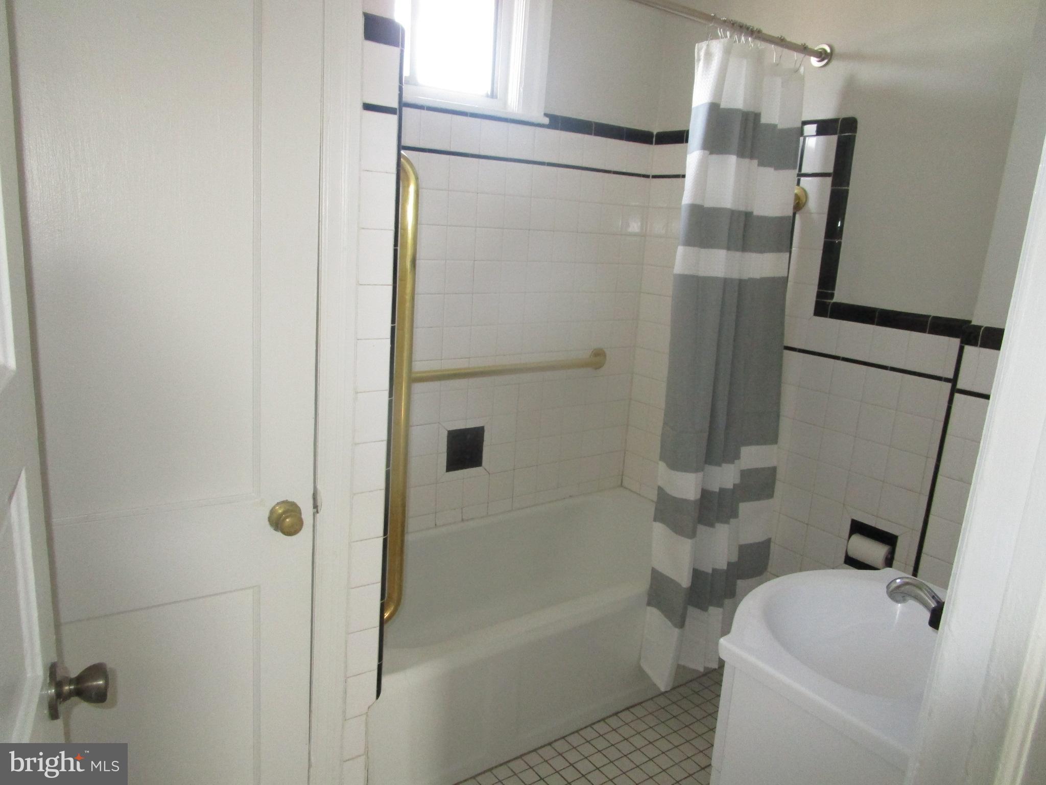 125 West Eagle Road, Unit 2 Havertown, PA 19083 - Photo 6 of 8 a bathroom with a bathtub and a shower