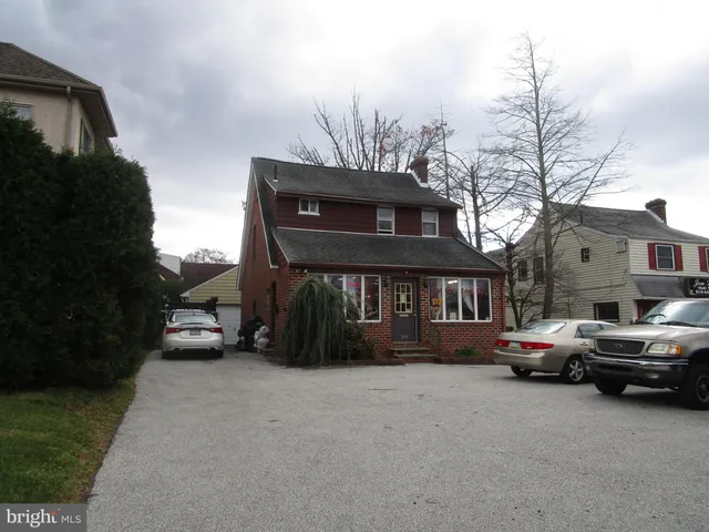 a car parked in front of a house
