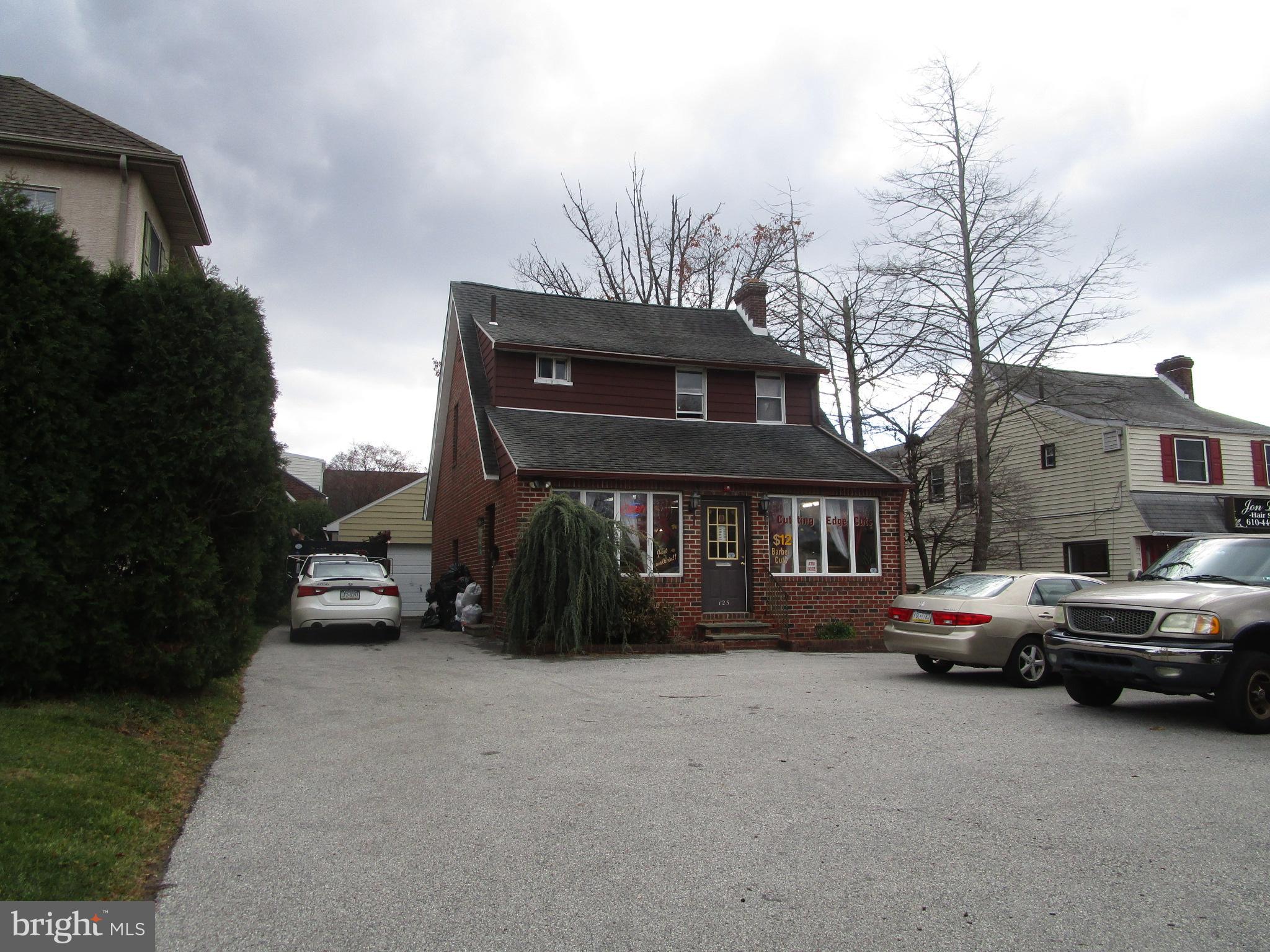 125 West Eagle Road, Unit 2 Havertown, PA 19083 - Photo 7 of 8 a car parked in front of a house