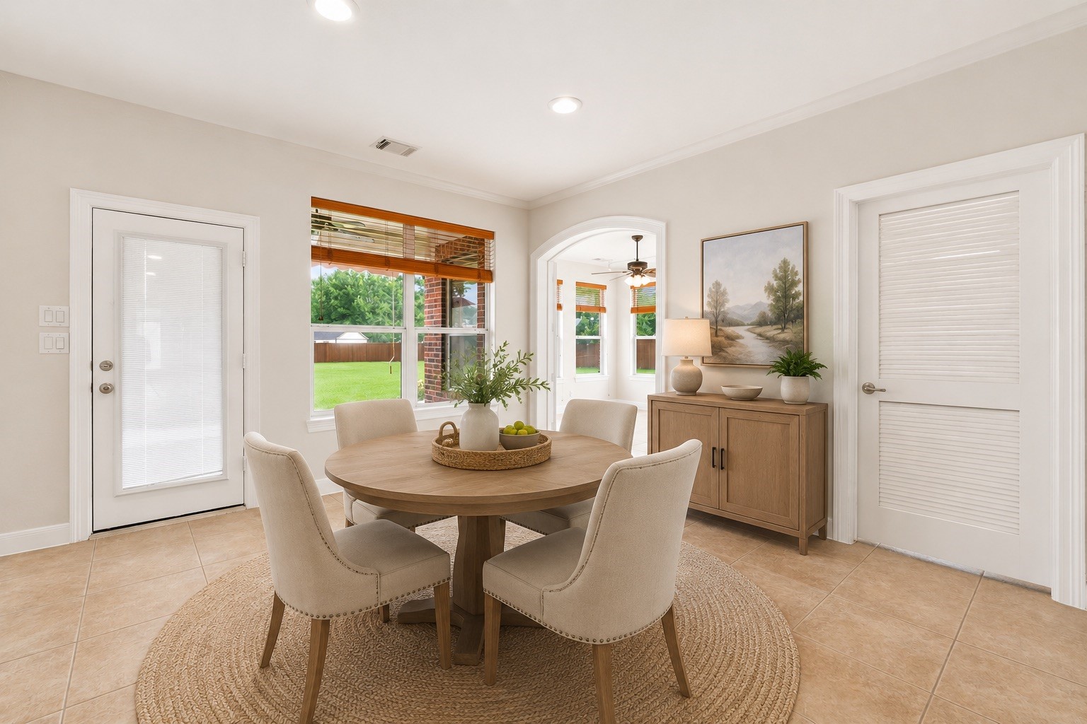 2716 Silverstone Way Conroe, TX 77304 - Photo 11 of 27 Spacious breakfast nook offers serene backyard views. Virtually staged.