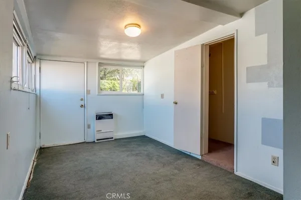 an empty room with windows