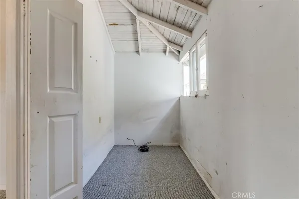 a bathroom with a tub and shower