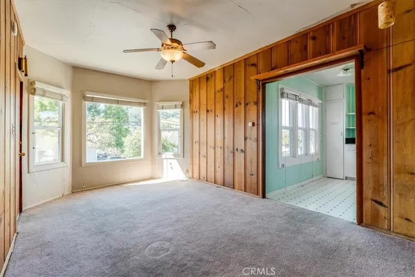 a view of a living room and a window