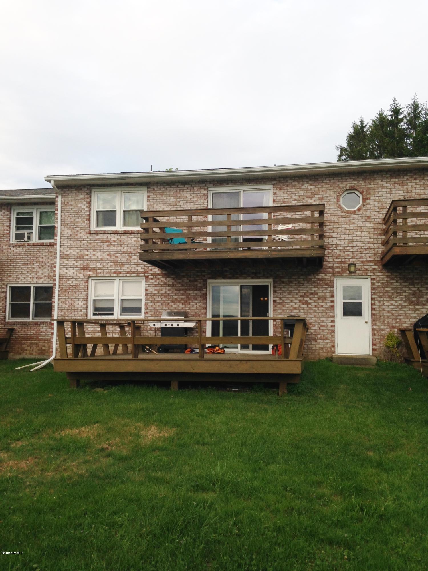4 Onota Lane, Unit 2 Pittsfield, MA 01201 - Photo 15 of 17 a view of a house with a garden