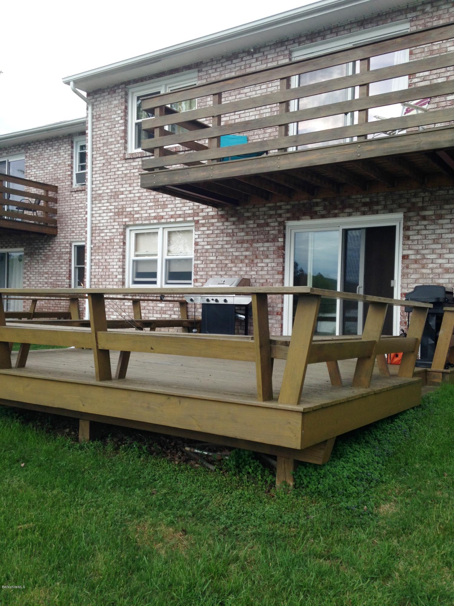 4 Onota Lane, Unit 2 Pittsfield, MA 01201 - Photo 16 of 17 a view of a house with a swimming pool