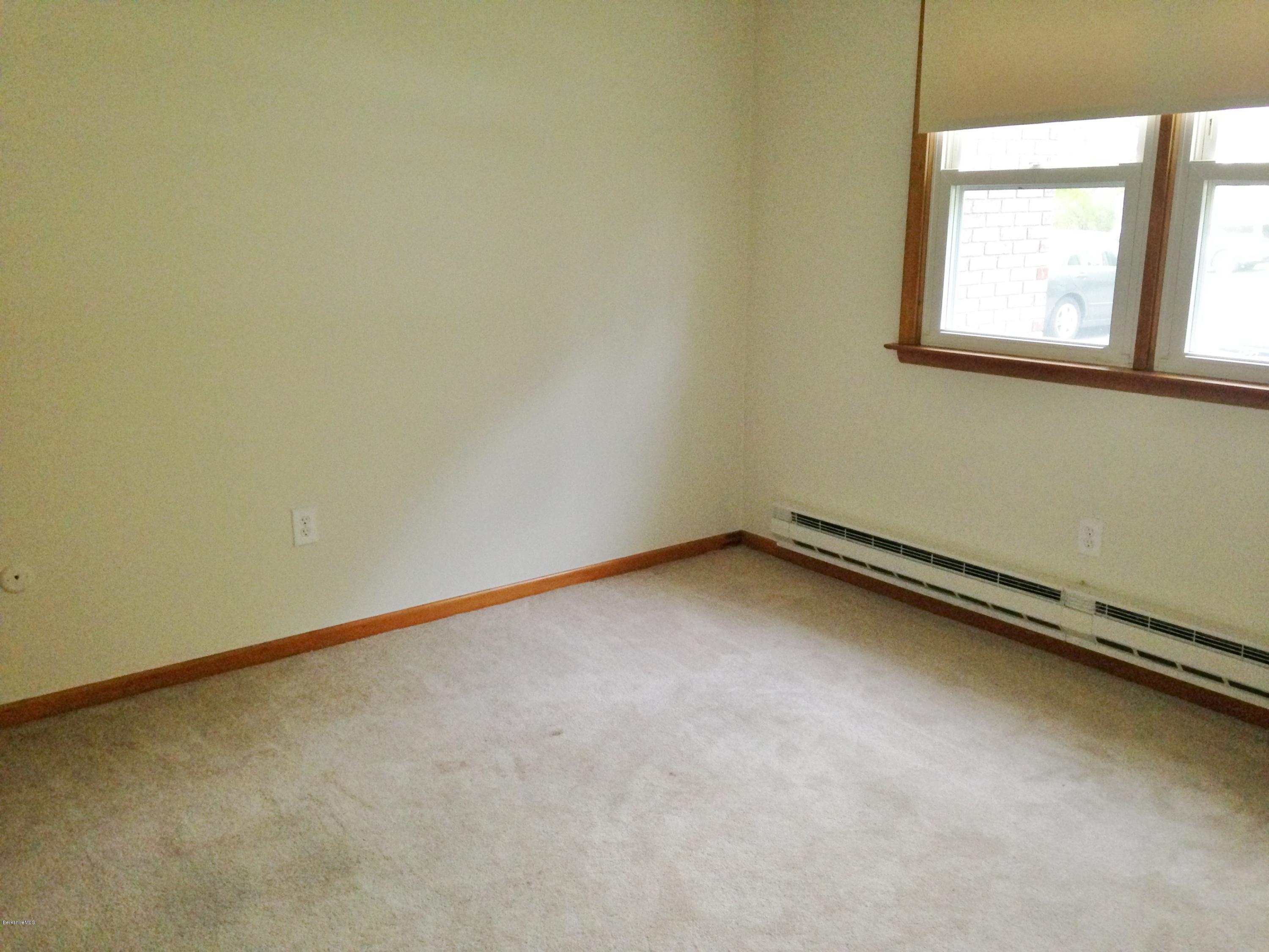4 Onota Lane, Unit 2 Pittsfield, MA 01201 - Photo 10 of 17 an empty room with a window