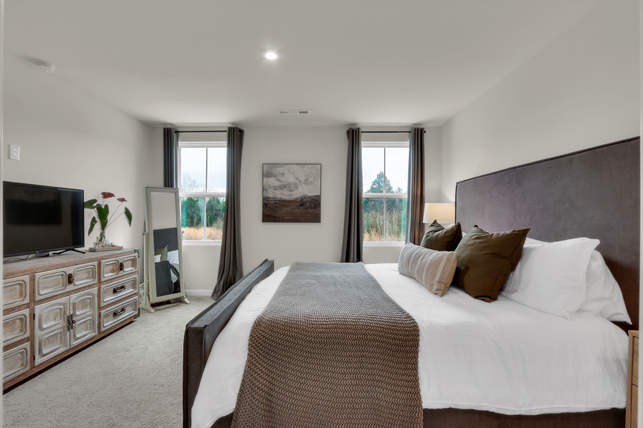 1732 Quail Run Way Spring Hill Spring Hill, TN 37174 - Photo 15 of 28 a bedroom with a bed and a flat screen tv