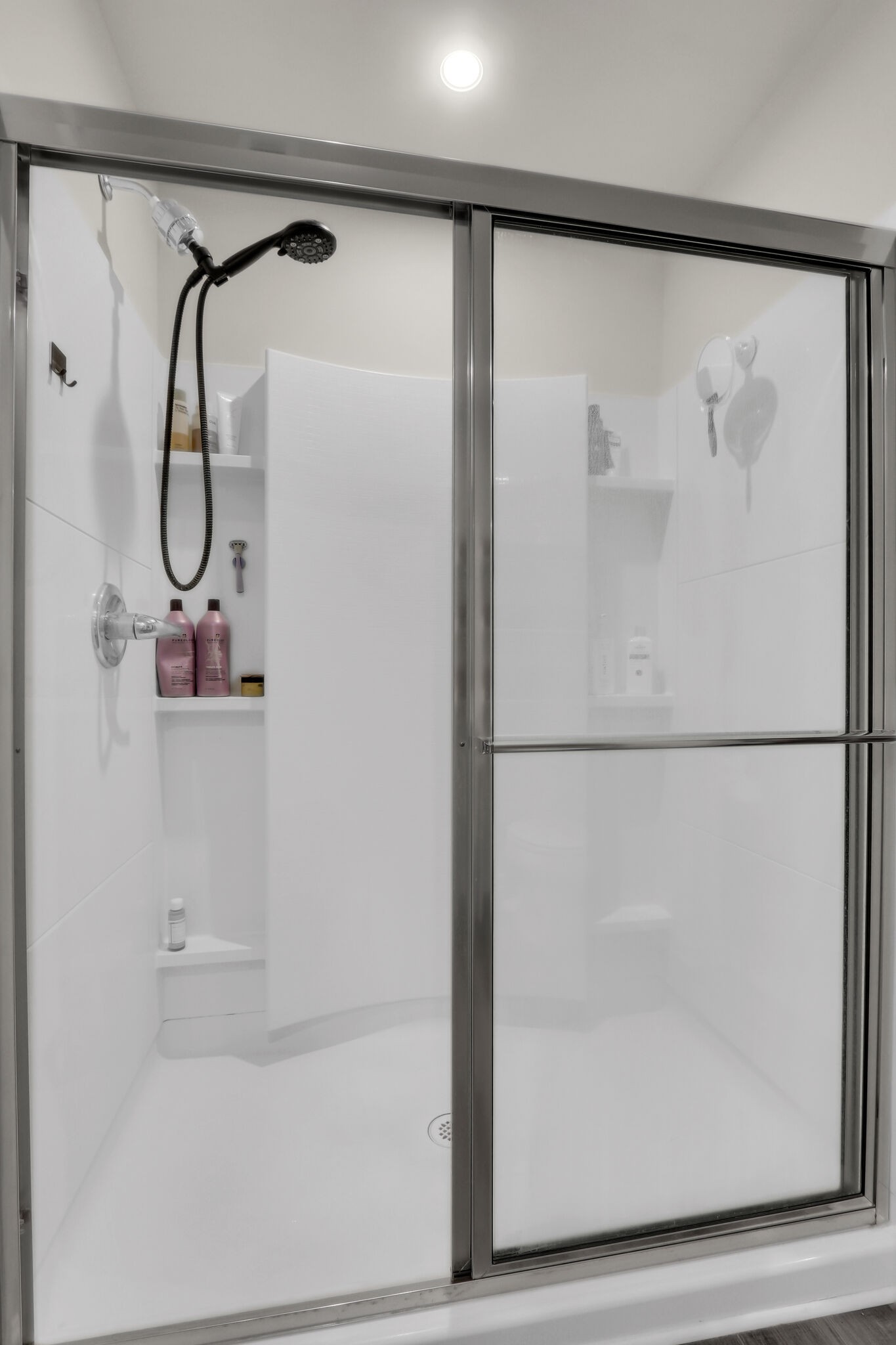 1732 Quail Run Way Spring Hill Spring Hill, TN 37174 - Photo 17 of 28 a bathroom with a glass shower door