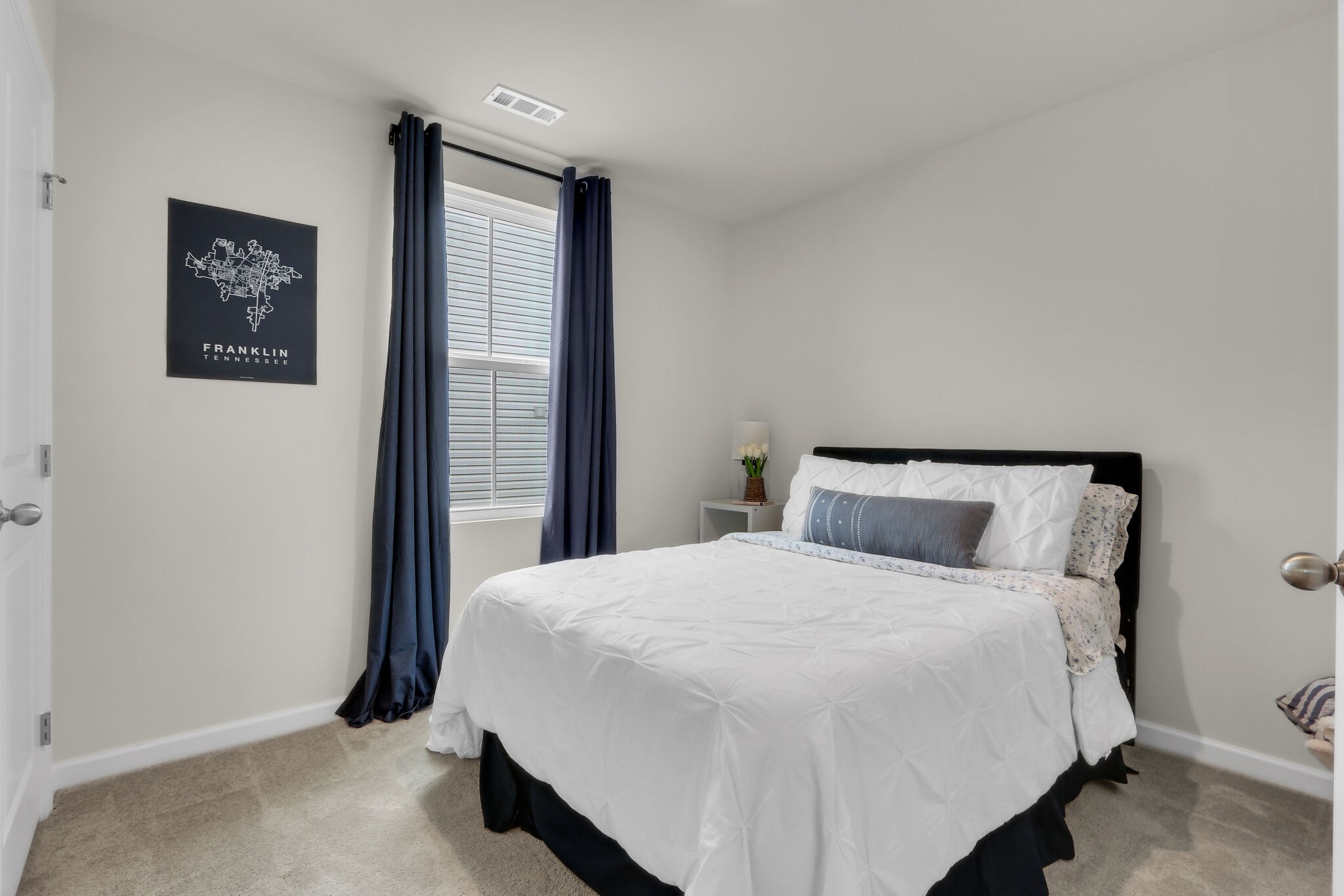 1732 Quail Run Way Spring Hill Spring Hill, TN 37174 - Photo 20 of 28 a bedroom with a bed and a window