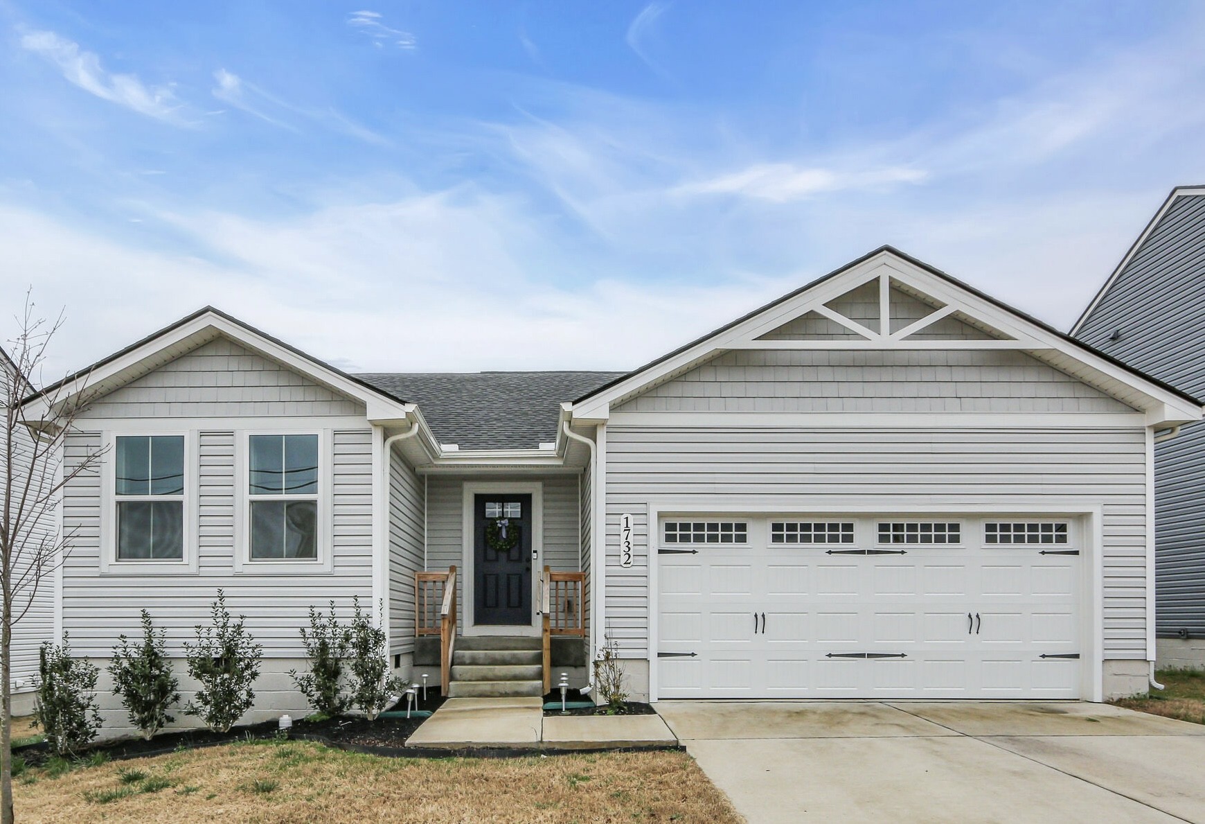 1732 Quail Run Way Spring Hill Spring Hill, TN 37174 - Photo 2 of 28 a front view of a house with a yard