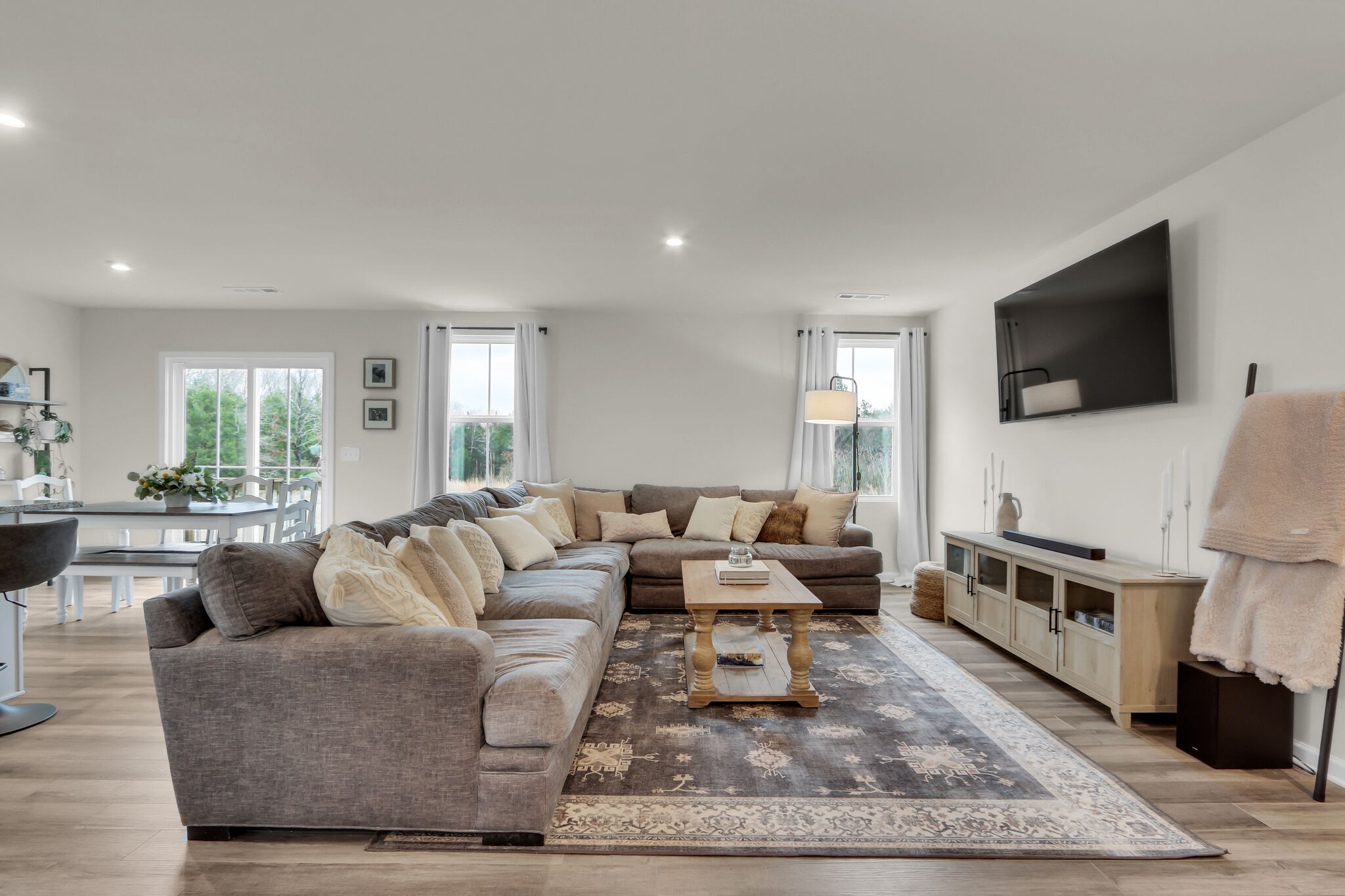 1732 Quail Run Way Spring Hill Spring Hill, TN 37174 - Photo 3 of 28 a living room with furniture and a flat screen tv