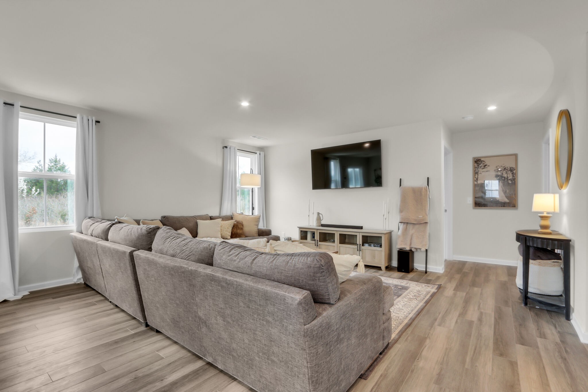 1732 Quail Run Way Spring Hill Spring Hill, TN 37174 - Photo 4 of 28 a living room with furniture and a flat screen tv