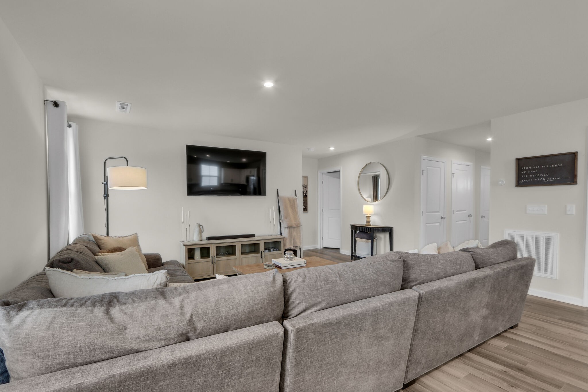 1732 Quail Run Way Spring Hill Spring Hill, TN 37174 - Photo 5 of 28 a living room with furniture and a flat screen tv