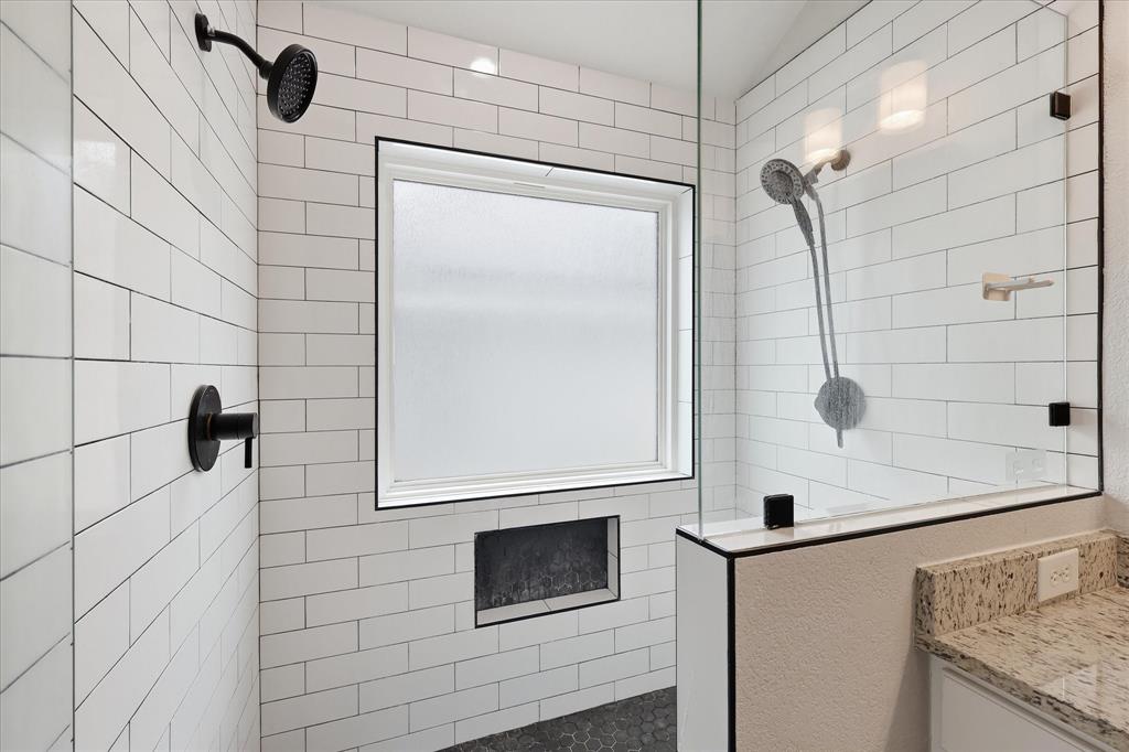 13236 Ridgepointe Road Fort Worth, TX 76244 - Photo 17 of 19 a bathroom with a shower and mirror
