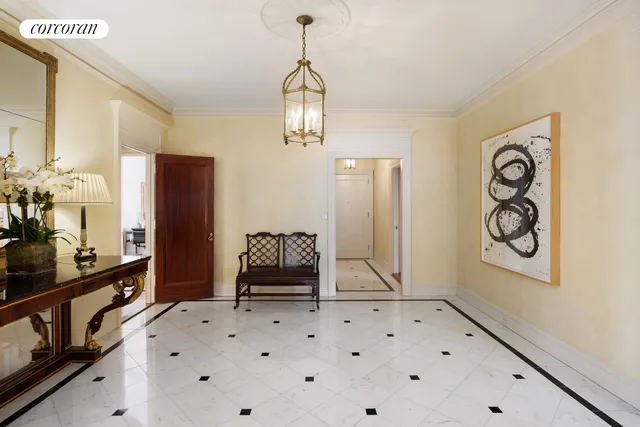 a bedroom with a bed and a dresser in it