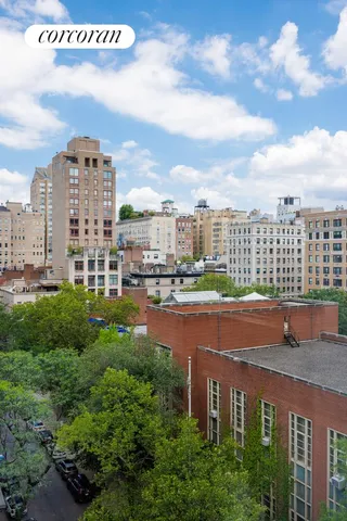 a view of a city with tall buildings
