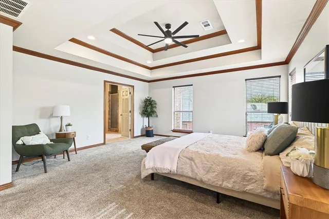 a bed room with a bed and a window