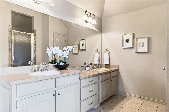 a bedroom with a bed window and couch