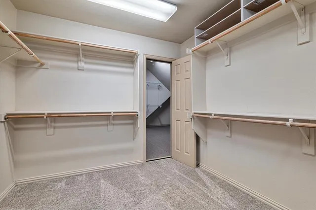 a view of an empty walk in closet