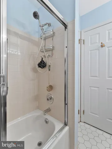 a bathroom with a bath tub