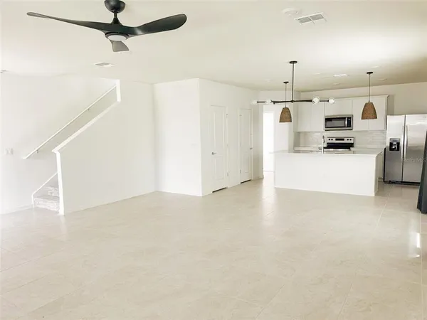 a view of a kitchen with a sink