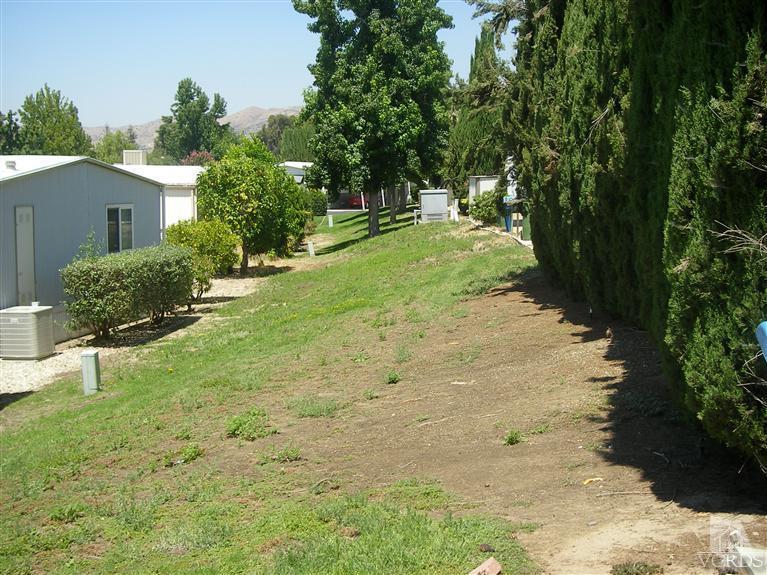 6480 Katherine Road, Unit 126 Simi Valley, CA 93063 - Photo 4 of 18 a view of backyard with green space