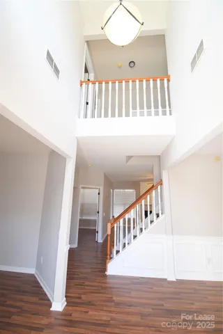 a view of entryway with wooden floor