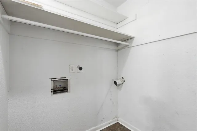 a view of small space with racks on the wall