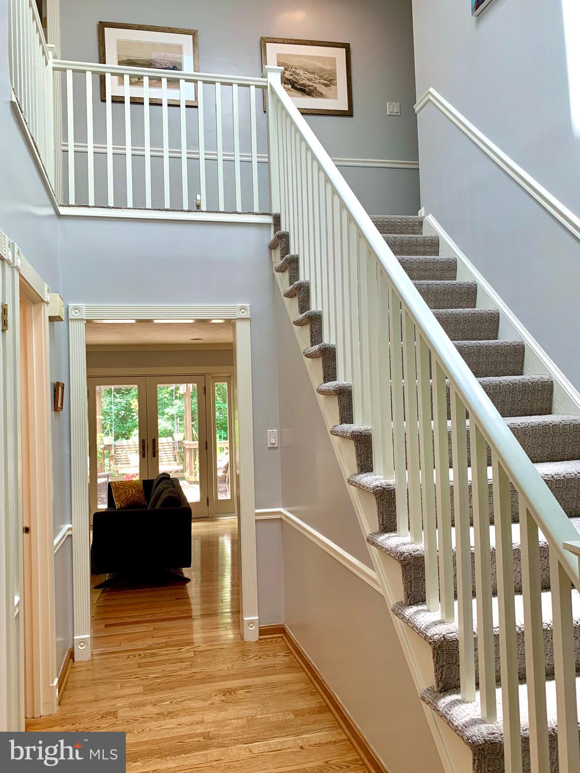 1960 Barton Hill Road Reston, VA 20191 - Photo 23 of 92 Foyer w/ New Banisters & Lovely Hardwood Floor