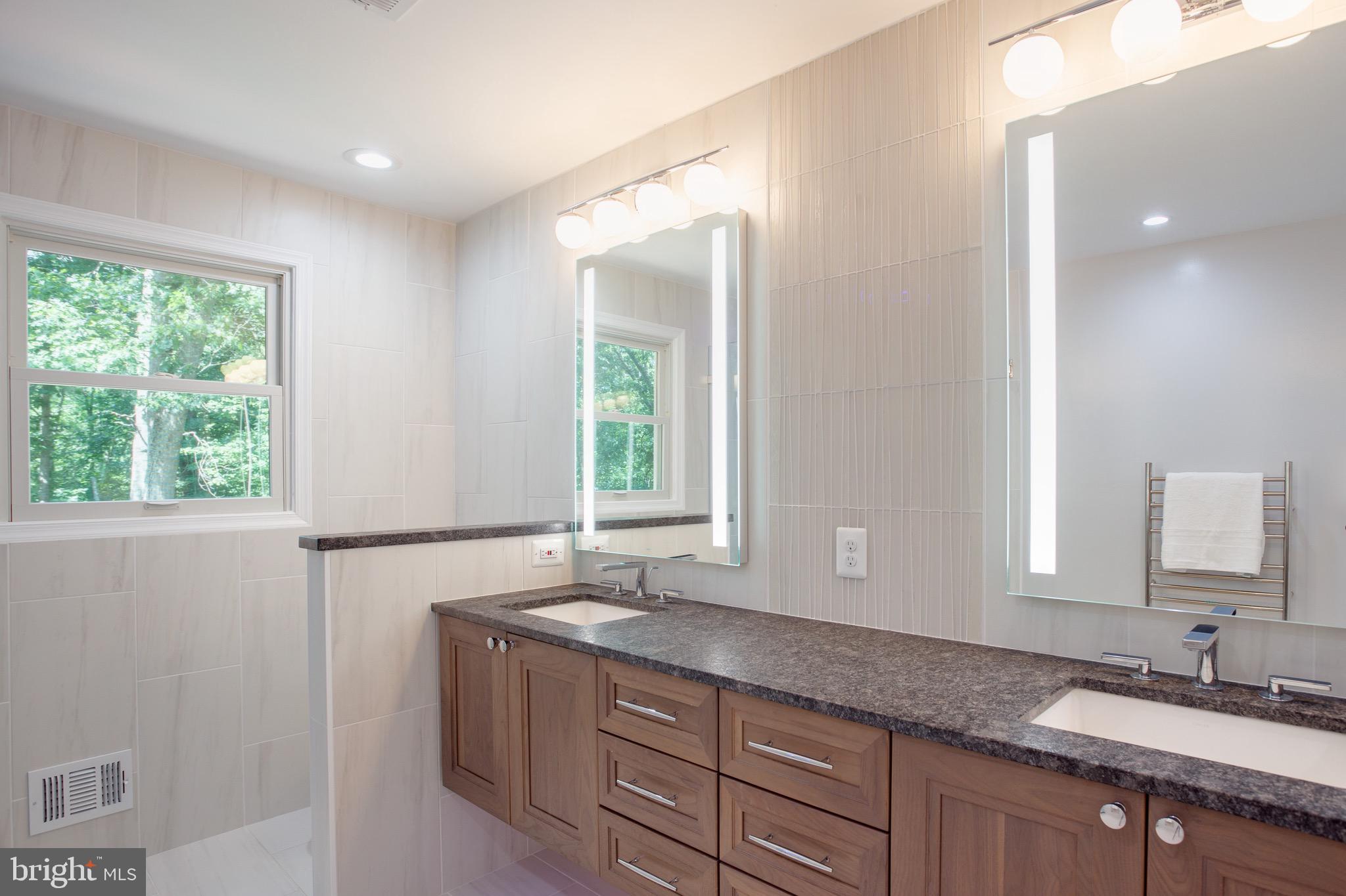 1960 Barton Hill Road Reston, VA 20191 - Photo 53 of 92 Backlit Mirrors, Suede Marble, Heated Floors