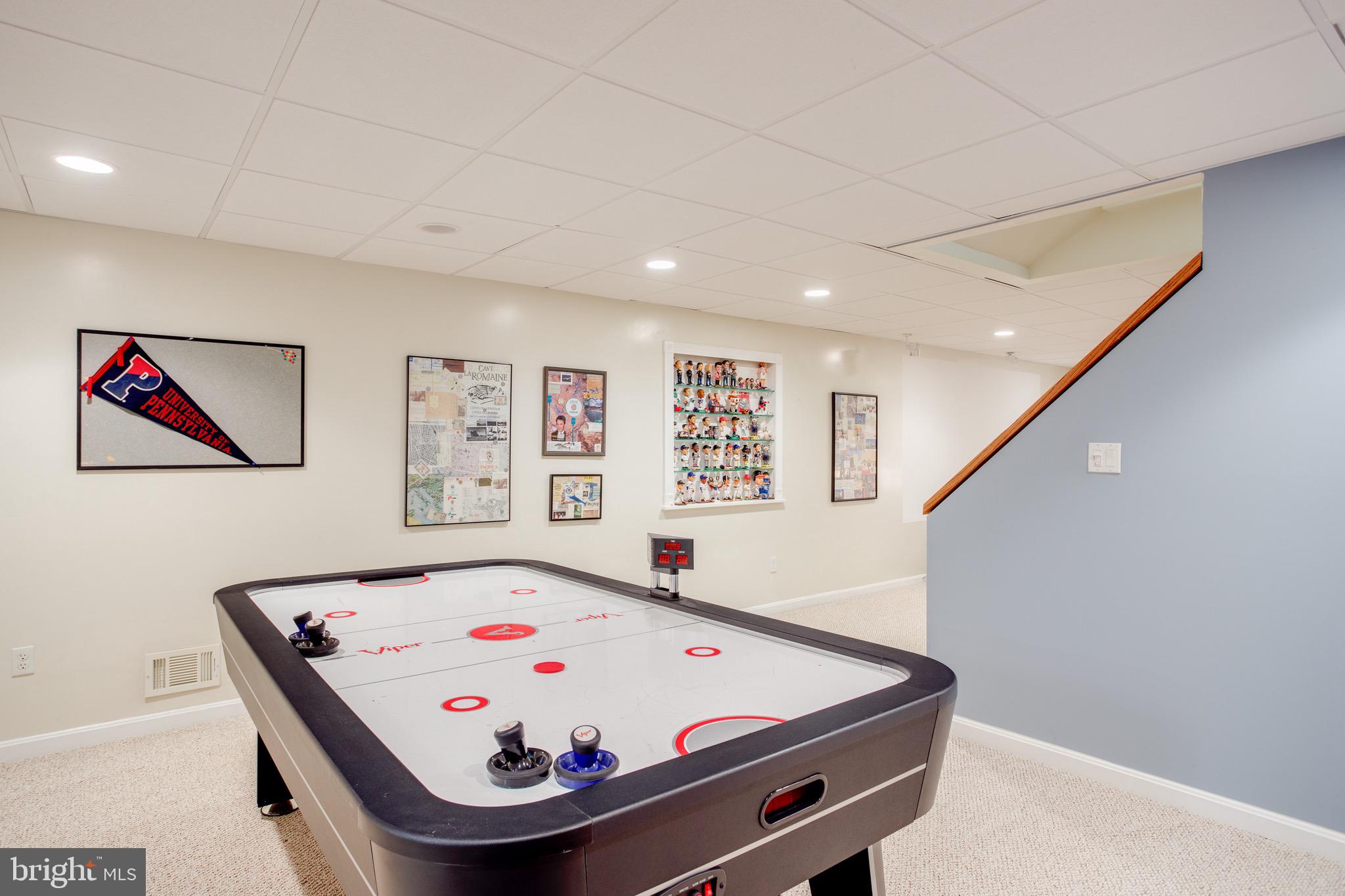 1960 Barton Hill Road Reston, VA 20191 - Photo 80 of 92 Lower Level Recreation Room Air Hockey Conveys