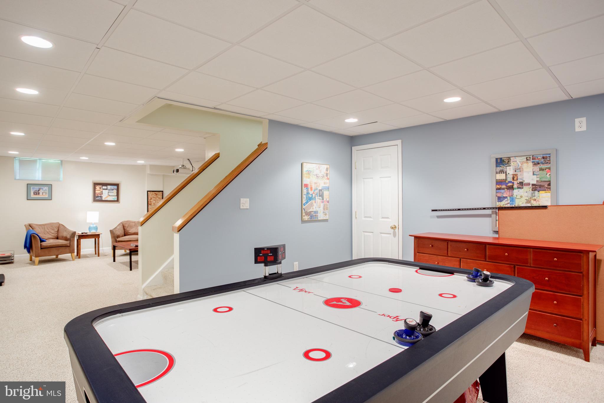 1960 Barton Hill Road Reston, VA 20191 - Photo 81 of 92 Lower Level Recreation Room Air Hockey Conveys