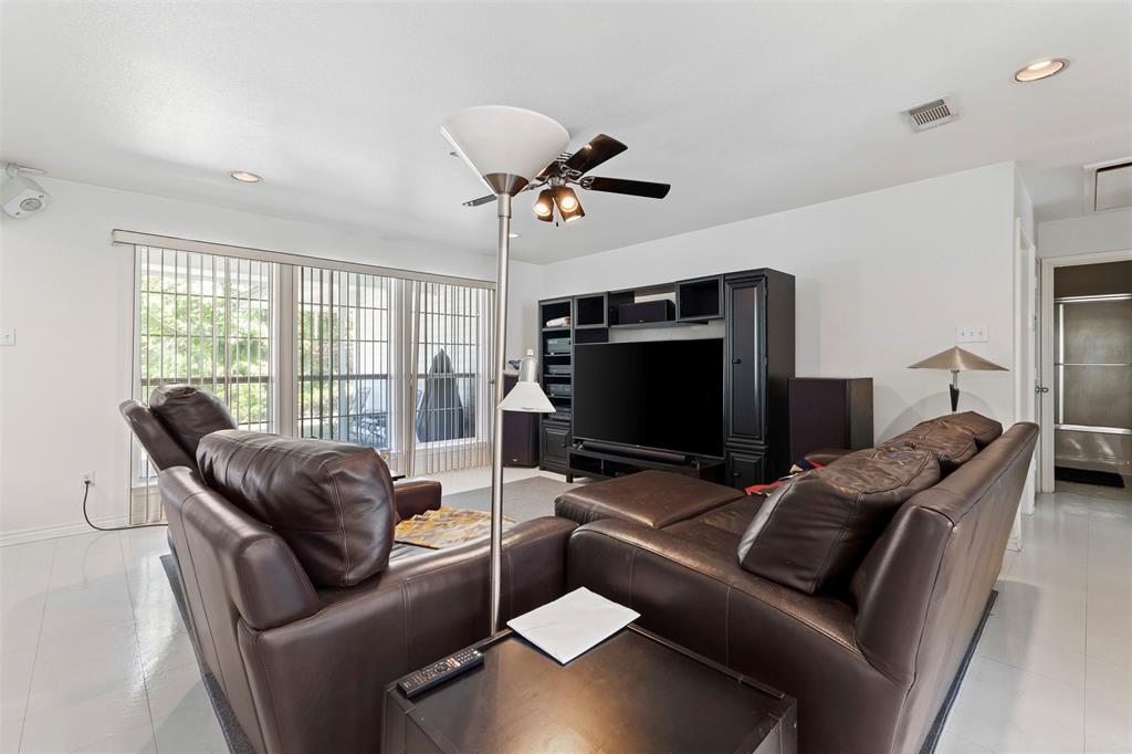 401 Rugged Drive Red Oak, TX 75154 - Photo 13 of 40 Living area featuring light-toned flooring, recessed lighting, and a ceiling fan
