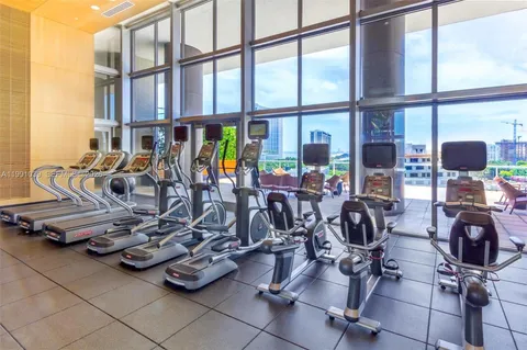 a view of a room with gym equipment