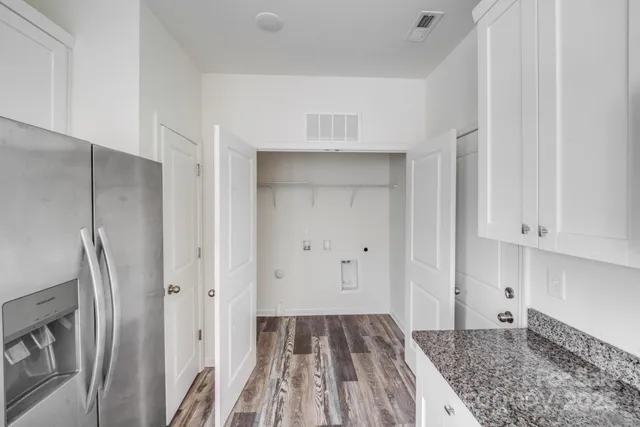 a view of a kitchen with a sink