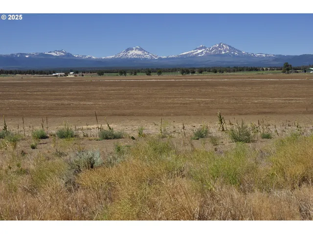 a view of an ocean and a mountain