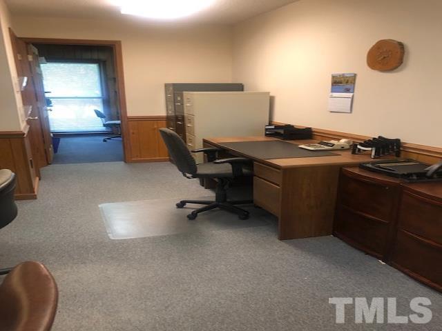 2822 Ellis Road Durham, NC 27703 - Photo 19 of 37 a view of workspace with a couch