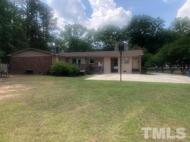 2822 Ellis Road Durham, NC 27703 - Photo 20 of 37 a view of a house with porch and garden