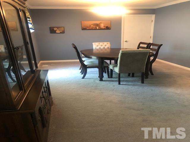 2822 Ellis Road Durham, NC 27703 - Photo 5 of 37 a view of a workspace with furniture