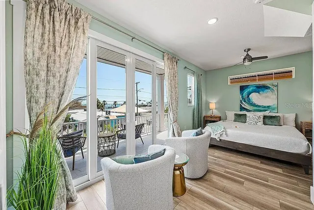 a room with a bed and furniture