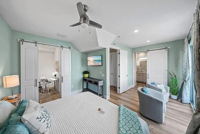 a bathroom with a sink a mirror and a shower
