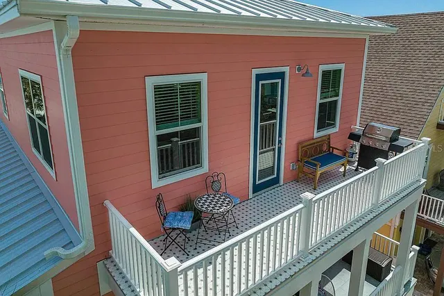a view of outdoor dining space with a patio